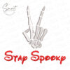 Halloween Stay Spooky Embroidery Design With Bone Hand Showing V Sign